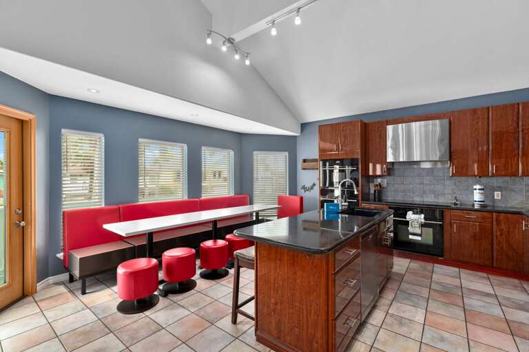Fully equipped kitchen and dining area with plenty of seating available! Fully equipped kitchen and dining area with plenty of seating available!