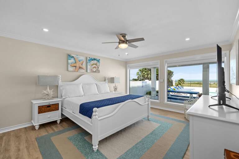 Master Bedroom offers beautiful views towards the private pool and beach!