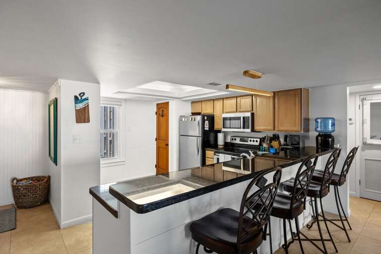 Fully equipped kitchen with pots, pans, dishware and glassware to prepare your favorite home cooked meals