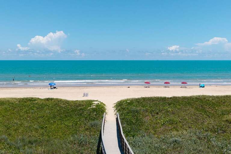 Beach-path Leading To Serene Sea, Sunny Sky, Sands Sprinkled With Colorful Umbrellas