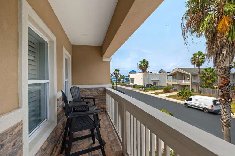 Enjoy peaceful neighborhood views from the front balcony.