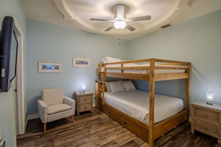 Second guest room with queen over queen bunk beds, plus twin trundle.