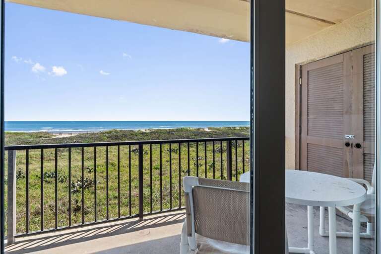 Private beachfront balcony with sweeping ocean views and plenty of sea breeze.