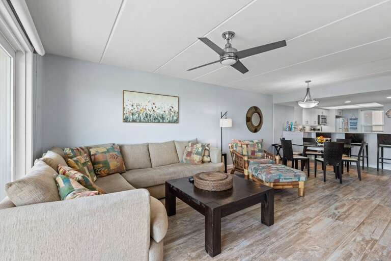 Spacious open-concept design connecting dining and living spaces for family gatherings and entertaining.