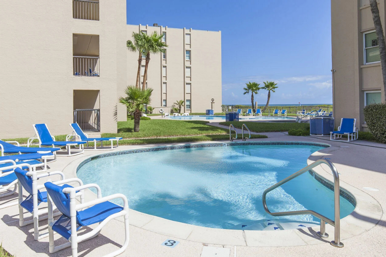 Spend the afternoon lounging beside the sparkling beachfront pool.