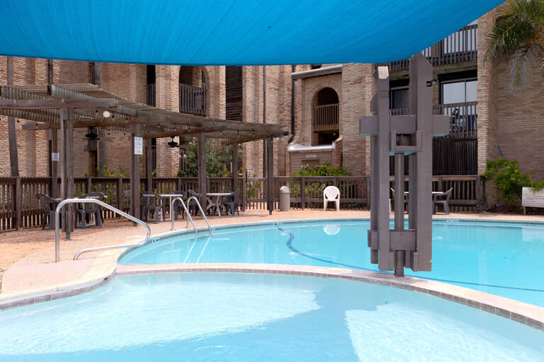 A closer look at Marisol's pool entry and shaded pergola, providing a refreshing retreat from the South Texas sun.