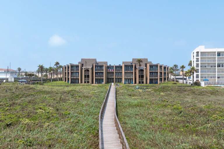 Direct beach access via Marisol's private boardwalk, leading you straight to the sandy shores of South Padre Island in just minutes.