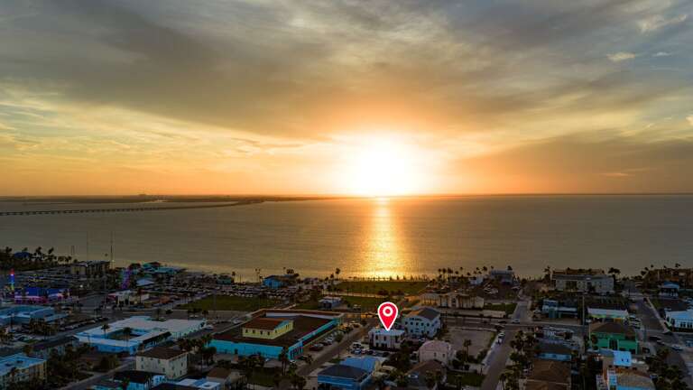 Aerial view of the house and bay.