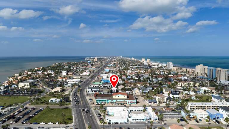 Aerial view of the house from beach to bay.