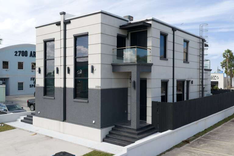 Modern exterior at 102B E. Whiting, a sleek South Padre Island retreat just minutes from the beach.