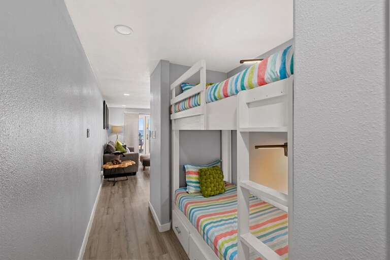 Built-in bunk beds are tucked into the hallway, perfect for kids or extra guests.