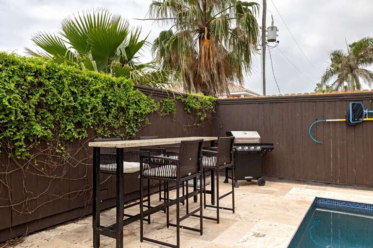 Fire up the grill and dine outdoors with bar seating.