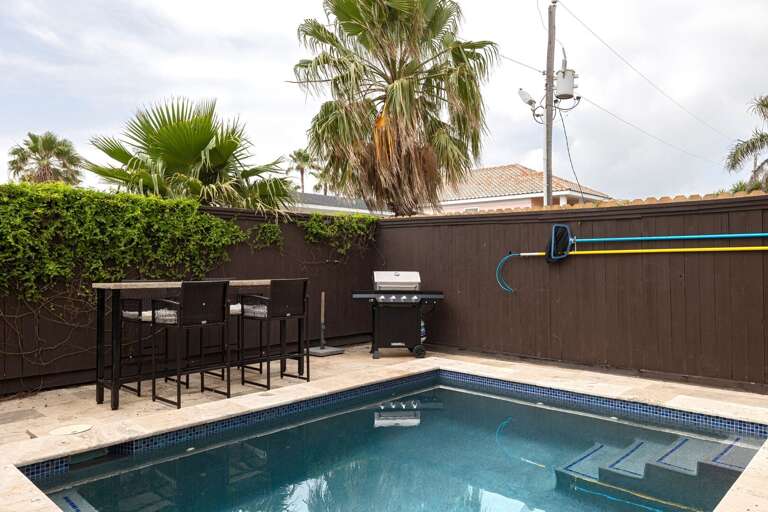 Fire up the grill and dine outdoors with bar seating.