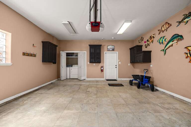 Garage with washer and dryer, plus space for beach gear and storage