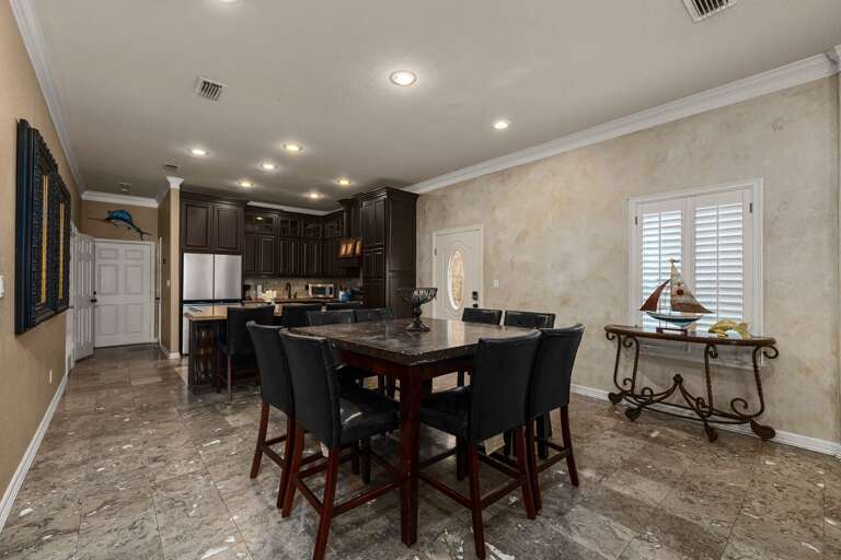Gather around the table with the kitchen just steps away