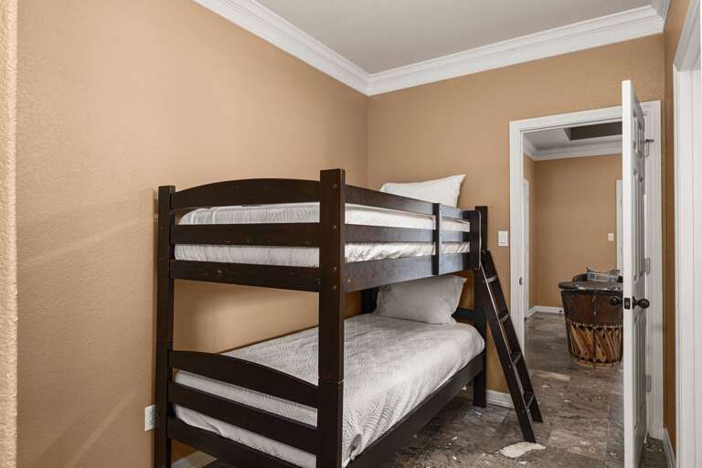 You'll find a cozy bunk nook just off the third and fourth bedrooms, a fun and convenient sleeping spot that kids will love.