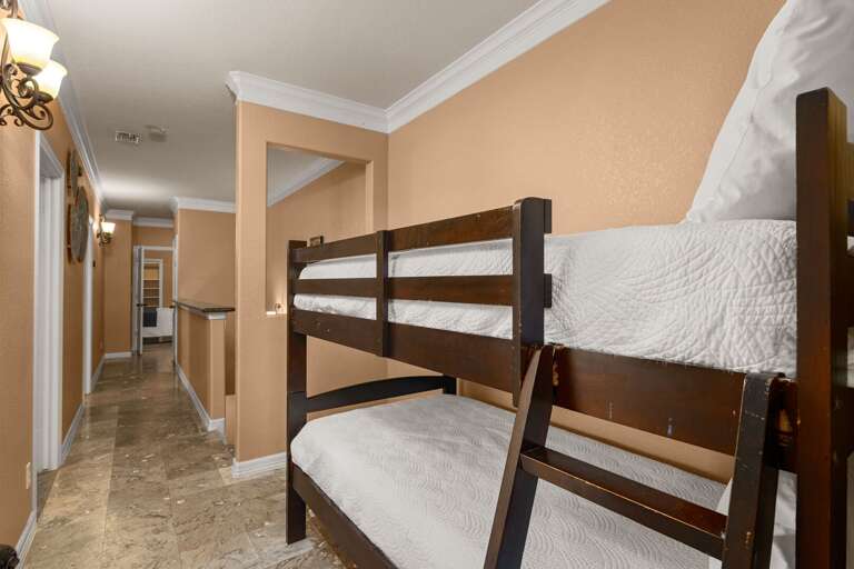 You'll find a cozy bunk nook just off the third and fourth bedrooms, a fun and convenient sleeping spot that kids will love.