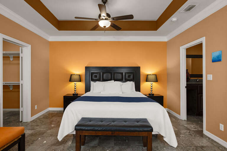 You'll love retreating to this spacious master suite, complete with a king bed and a warm, inviting atmosphere.