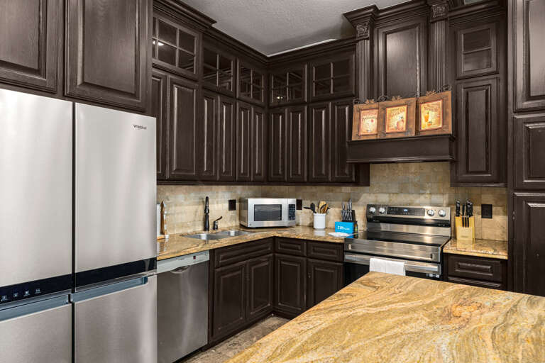 Spacious kitchen with modern appliances and ample counter space