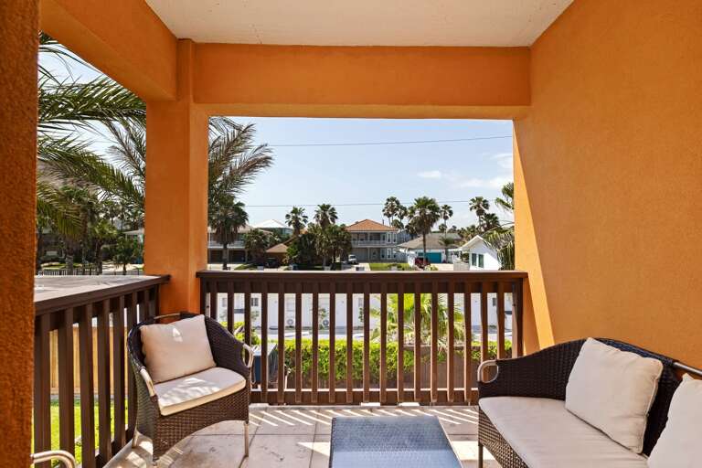 Start your morning or wind down your evening on this cozy balcony, where you can sit back and enjoy the island breeze.