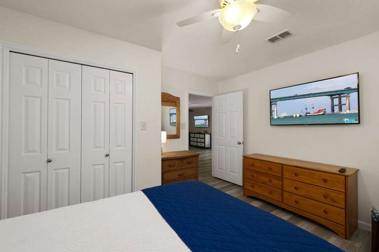 Third bedroom is equipped with a TV and located just off the downstairs living area