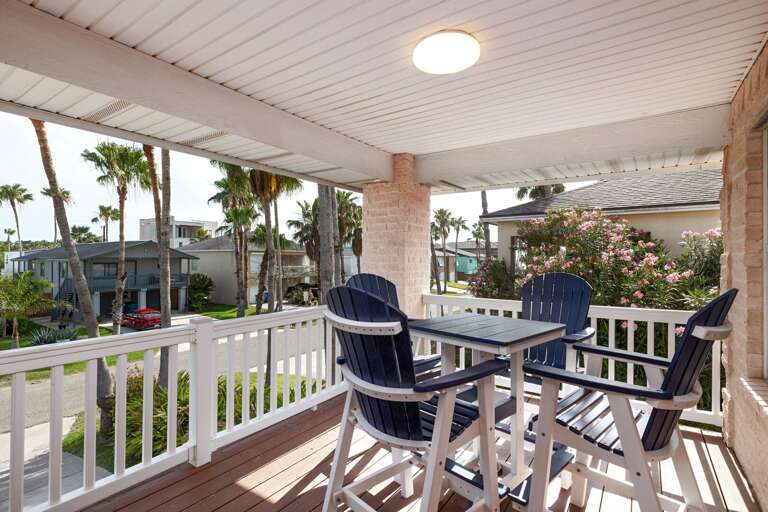 Front balcony where you can catch island breezes and seasonal fireworks over the bay