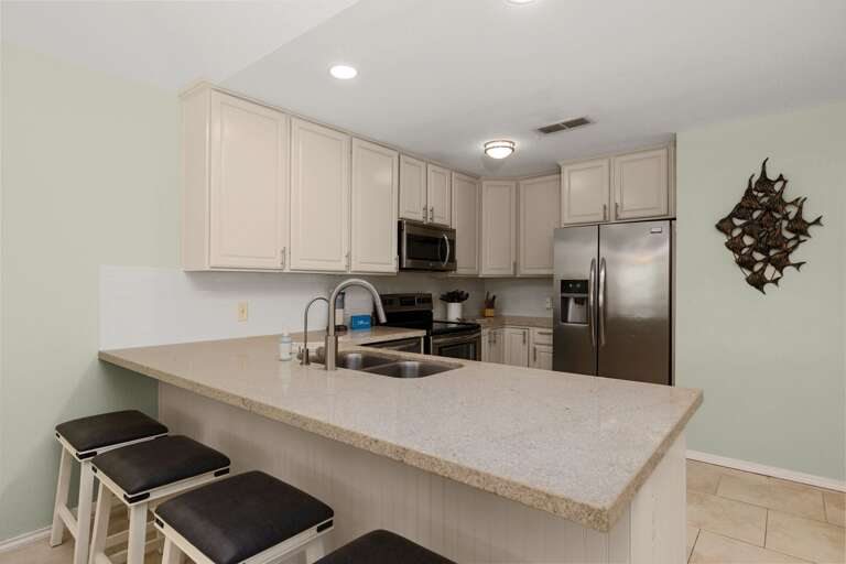 Spacious kitchen with bar seating—great for casual meals