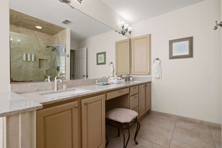 Spacious vanity area with ample counter space, ideal for getting ready for a day on the beach or night out