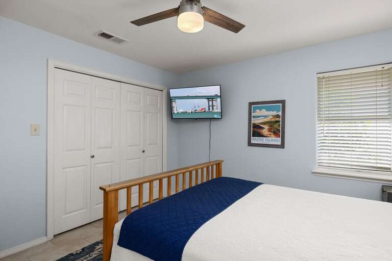 The suite is equipped with a TV and also has access to the balcony overlooking the pool