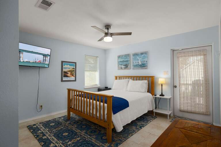 A tranquil suite with a full bed, offering comfort and a restful night's sleep (second bedroom)