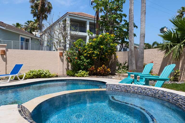 Unwind in the private hot tub, perfect for relaxing evenings under the stars