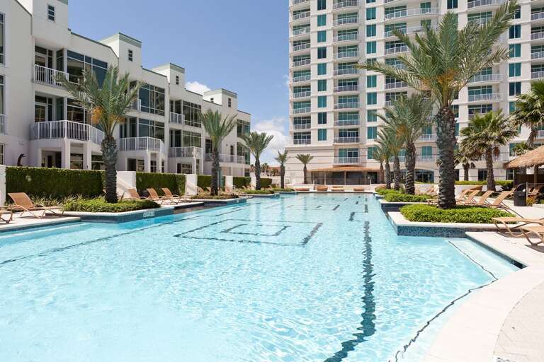 Cool off in the expansive resort pool just steps from the beach