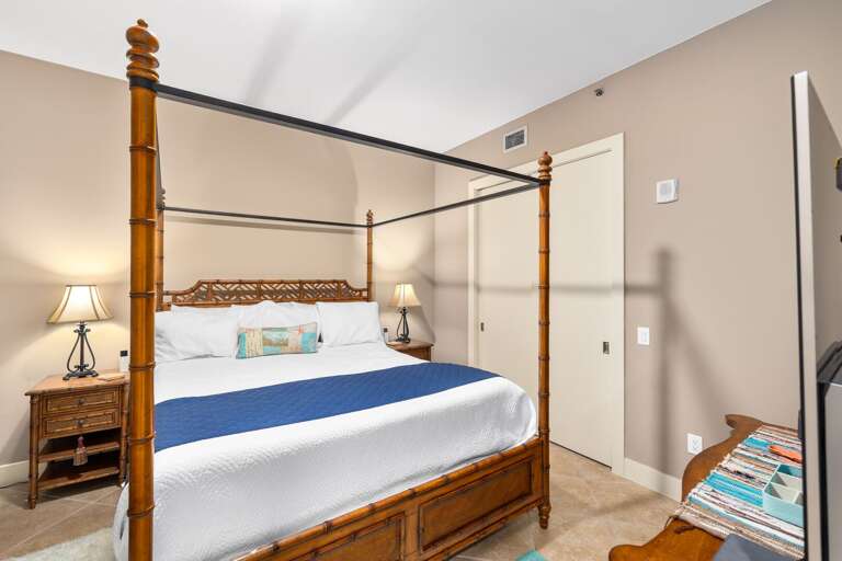 Cozy queen guest bedroom with comfortable coastal touches and restful space