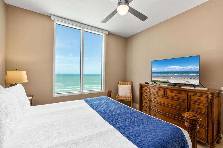 Enjoy peaceful mornings and endless blue water views from the primary suite
