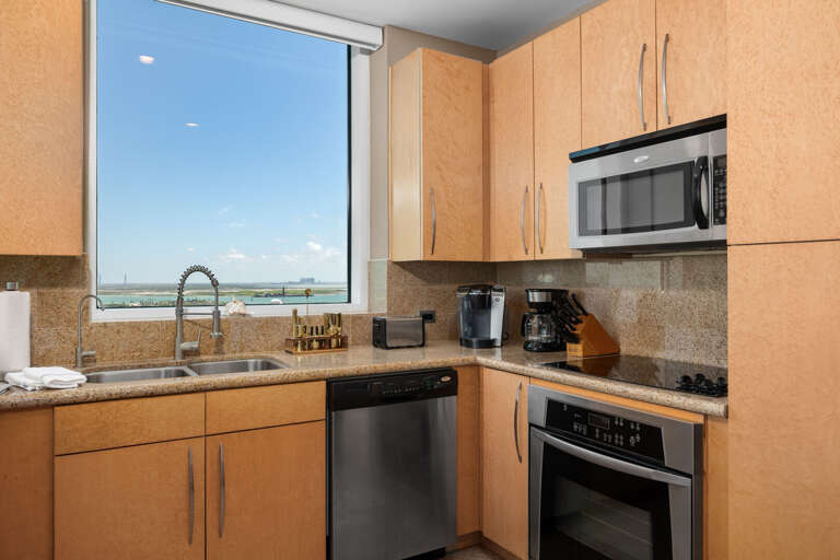 A modern kitchen stocked and ready for beach snacks, dinners, and gatherings