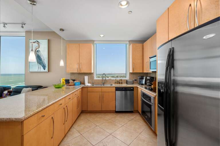 Prepare meals with beautiful gulf views from the fully equipped kitchen