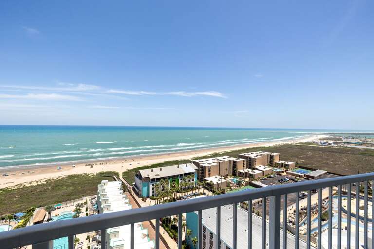 Soak in panoramic Gulf coastline views from the private beachfront balcony