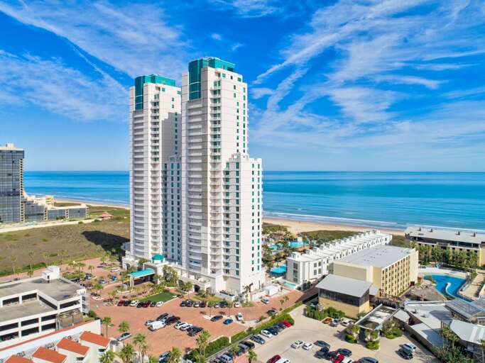 Stay steps from the beach at one of South Padre Island's premier beachfront resorts