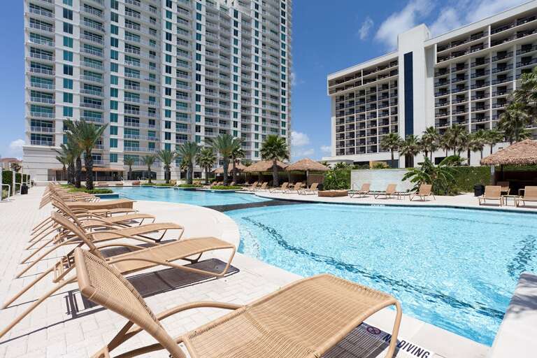 Stretch out beside the pool and soak in the South Padre sunshine