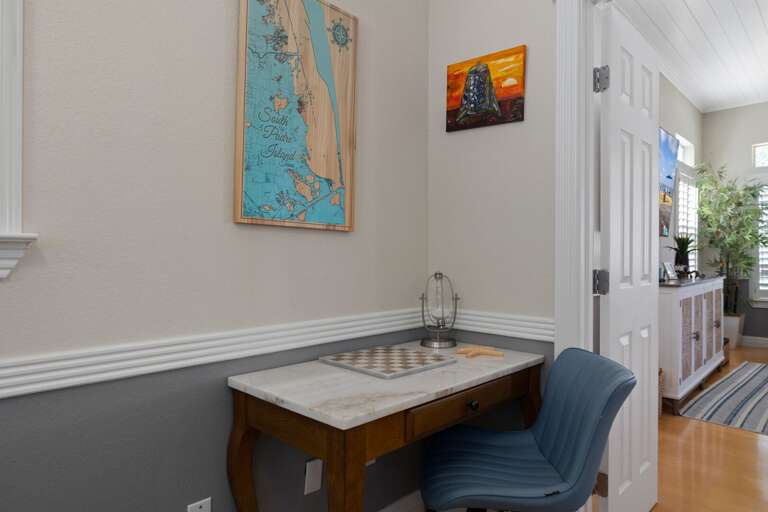 Bedroom four is versatile and offers a flexible space for additional guests, just off the living room.