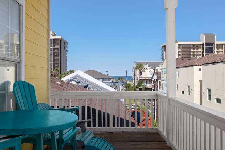 Enjoy the partial ocean views from the third floor balcony off the primary suite.