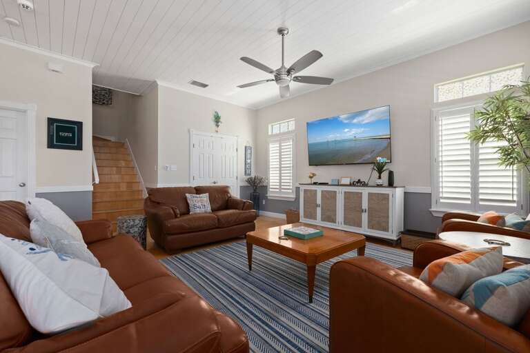 Kick back with family and friends in the open-concept living room designed for gathering.