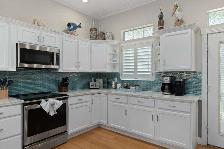 The open kitchen layout keeps everyone connected while meals are being prepared.