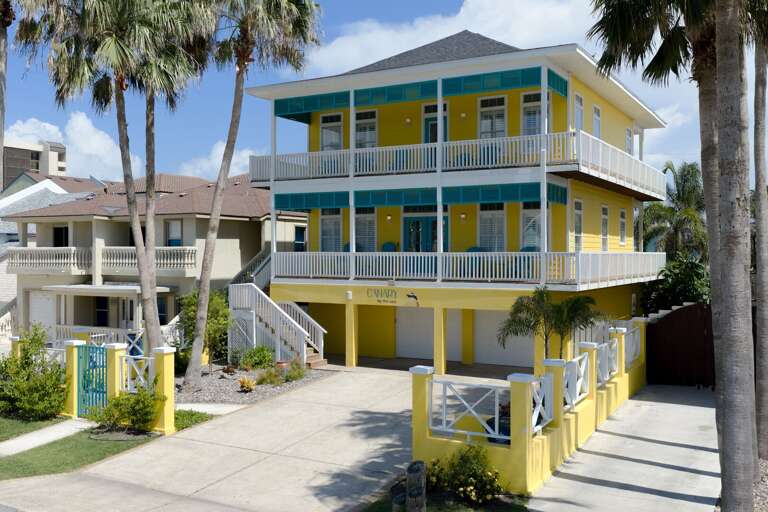 Your spacious beach home offers room for the whole group, inside and out.