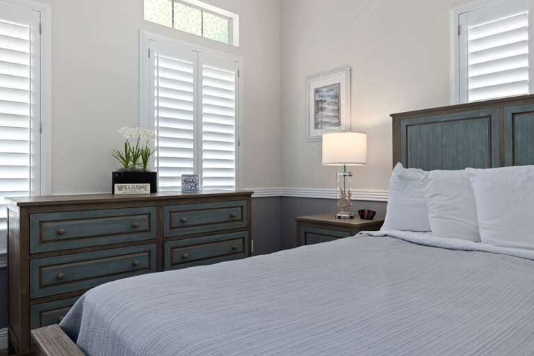 Stretch out and relax in this inviting king bedroom after a day of island adventures.