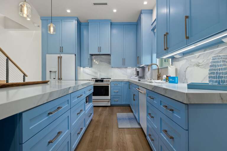 Enjoy cooking in the beautifully designed kitchen featuring modern appliances and plenty of preparation space.