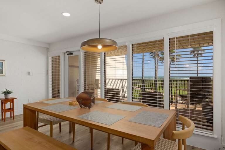 Enjoy breakfast or dinner with a view in the bright dining area overlooking the lush tropical surroundings.