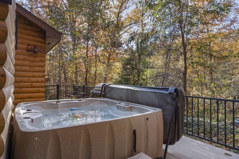 Outdoor Jacuzzi On Wooden Deck With Forest View