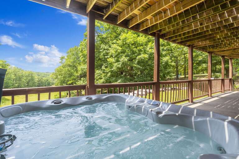 Outdoor Jacuzzi On Wooden Deck With Forest View