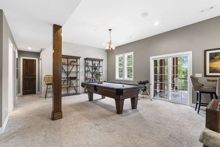Interior Room With Billiards Table And Furniture